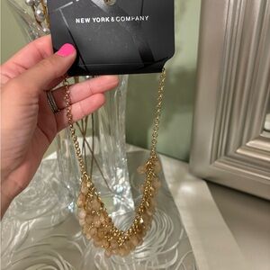 New York & Company Gold Cascading Charm Necklace